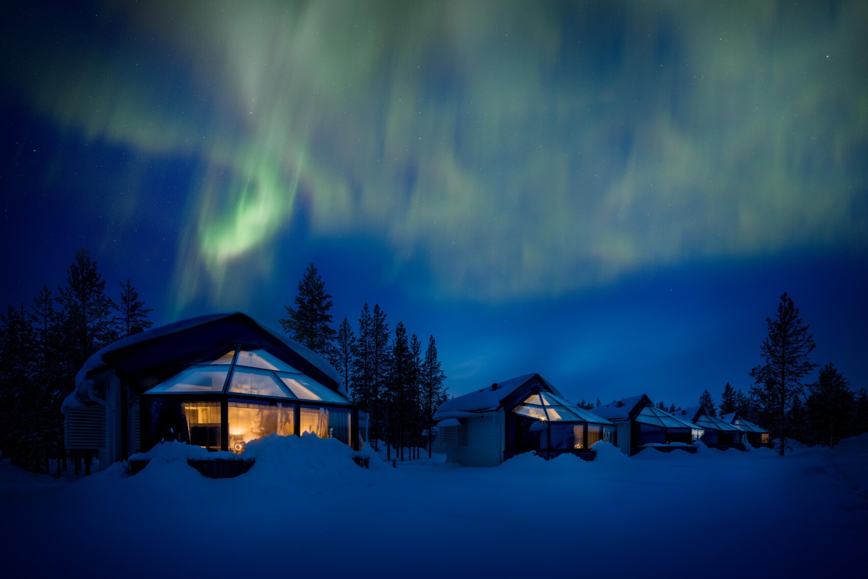 Northern Lights above glass igloos